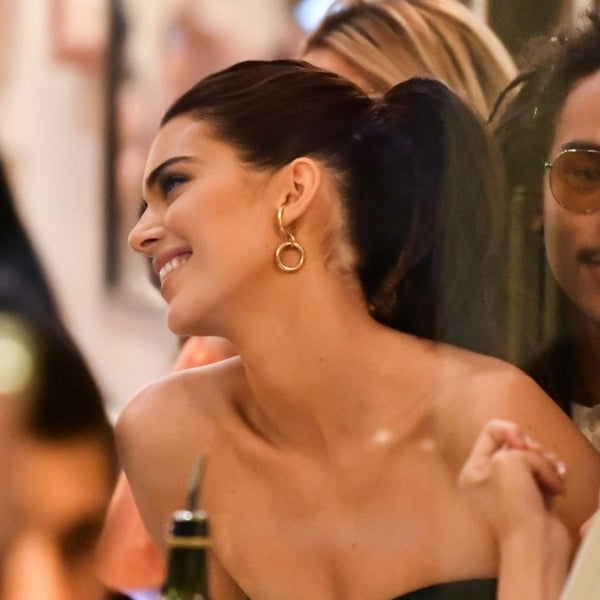 Kendall Jenner wears Lady Grey Latch Earrings during NYFW
