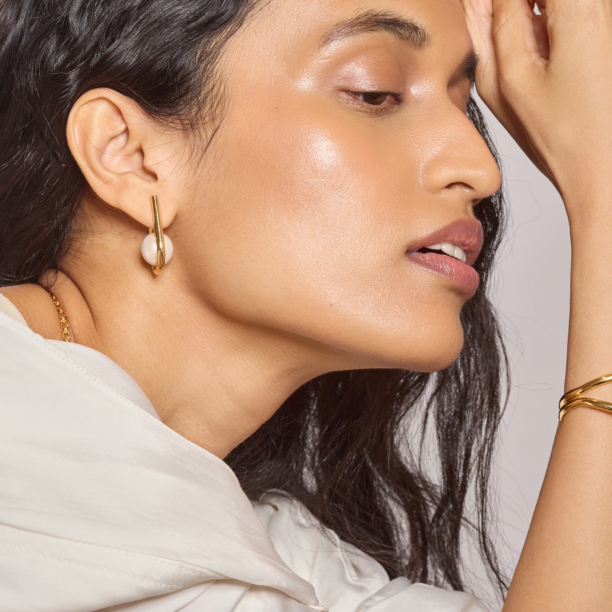 Chaise Earrings in Gold