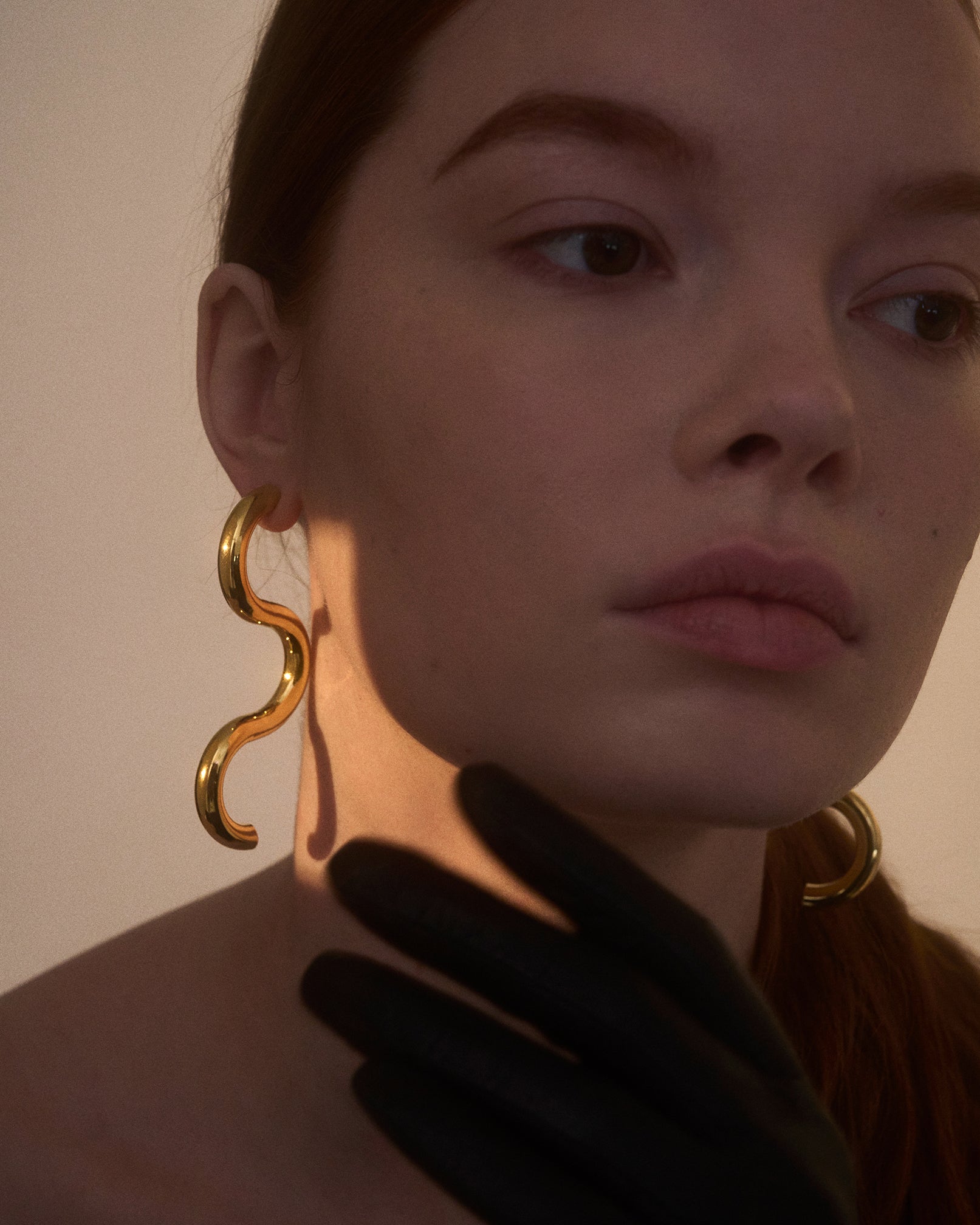 Serpentine Earrings in Gold