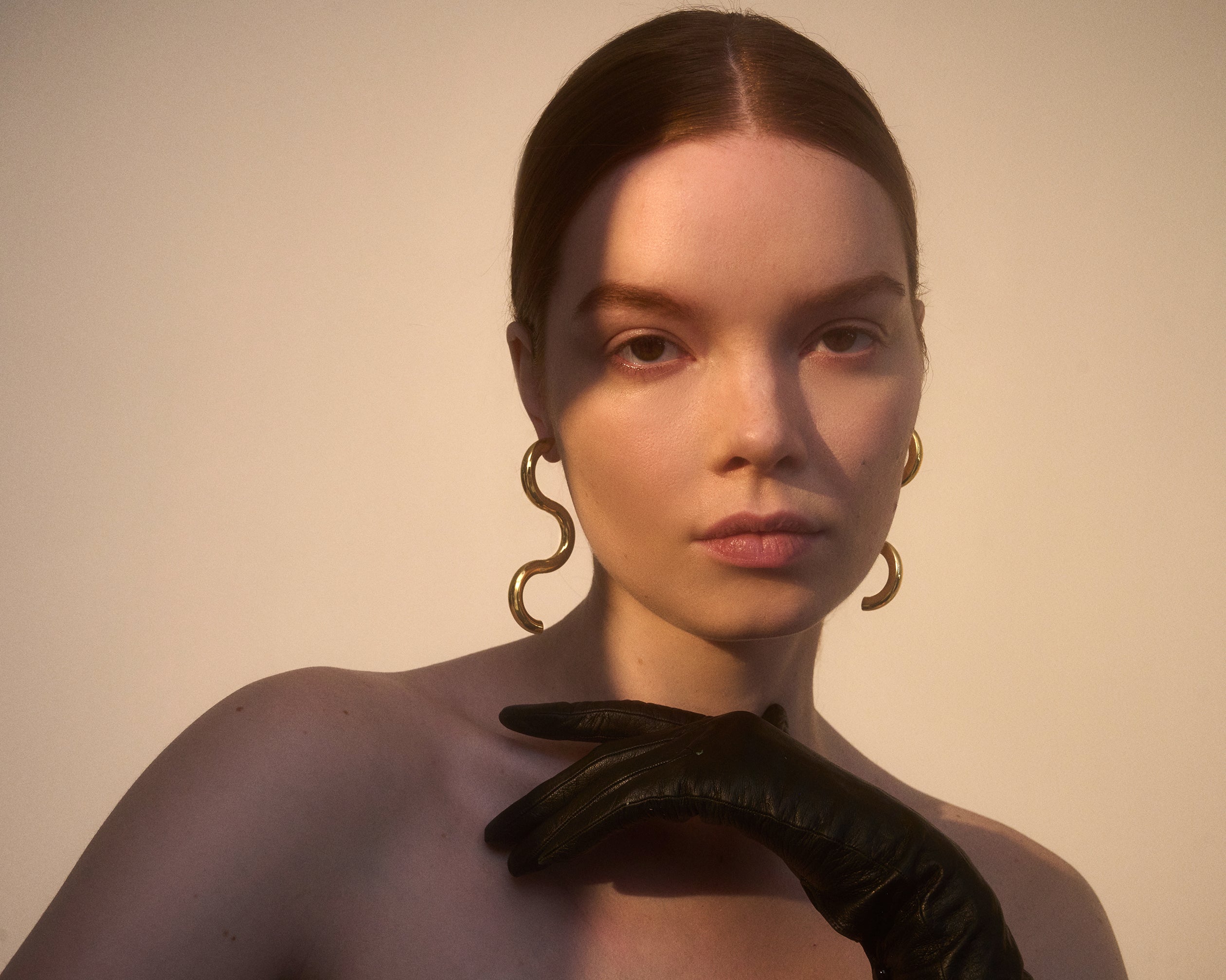 Serpentine Earrings in Gold