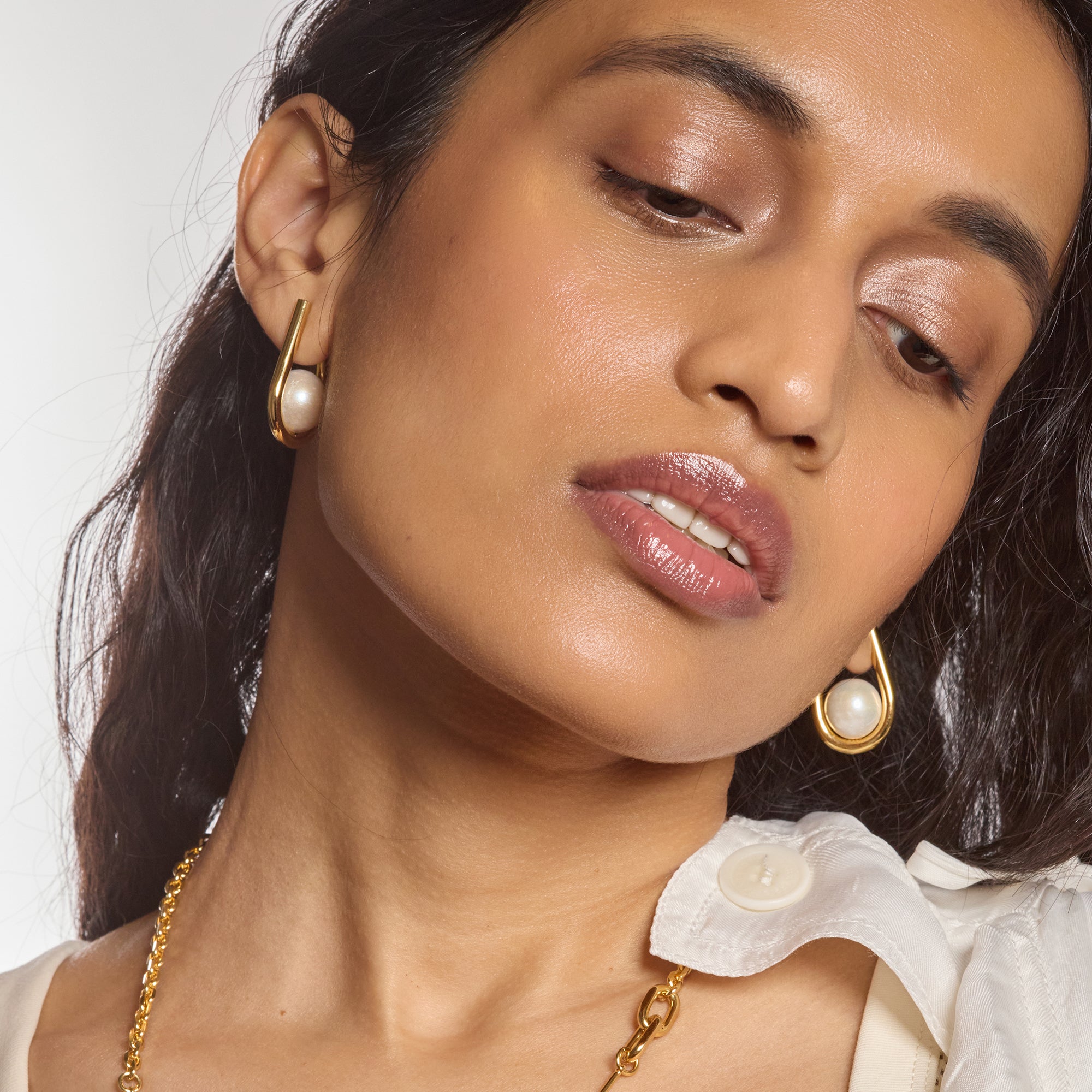 Chaise Earrings in Gold