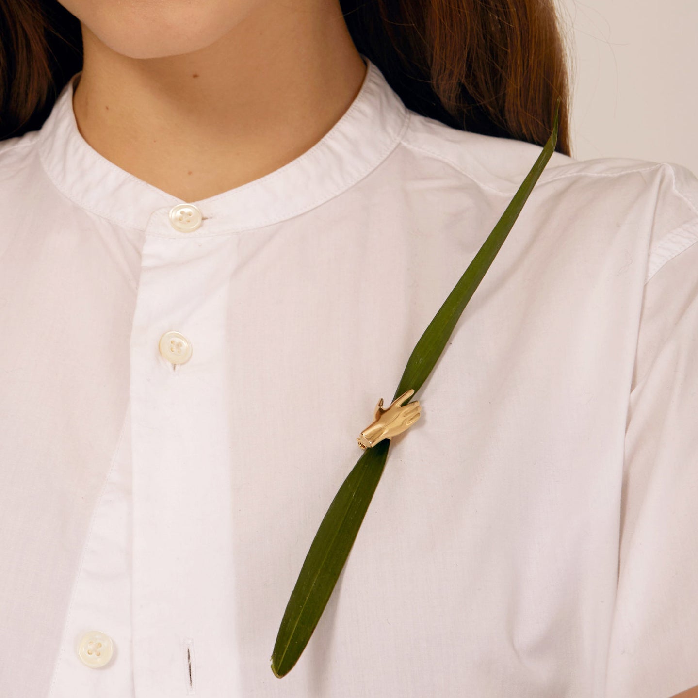 Grasp Botanical Brooch in Gold