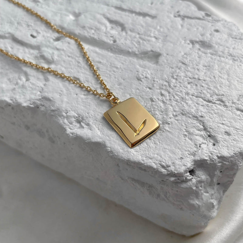 A initial clearance pendant
